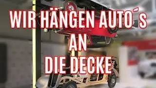 Wir h&auml;ngen Auto&acute;s an die Decke