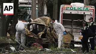 Car bomb and attack on helicopter in Colombia kill at least 17, including officers