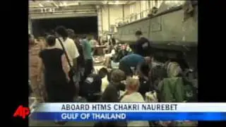 Military Rescues Tourists From Thai Floods