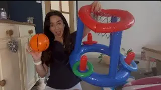 Blowing up an inflatable basketball hoop for swimming pools from SHEIN