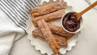 Turn Store-Bought Pizza Dough Into Sweet And Chewy Churros With Our Recipe