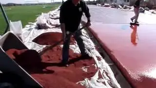 EPI Sports & Rubber Surfaces installation wear coat and granules running track