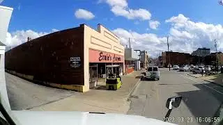 Classic button hook to make a right right turn onto a small street.
