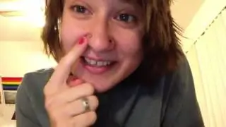 Double Nostril piercing and gross hair.