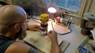 Handcarving a man cave sign.