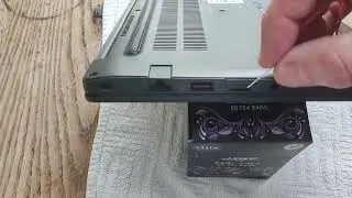 Dell Latitude 7290: Remove the SIM card and tray