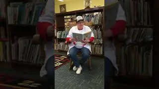 Director Sue reads Casey at the Bat