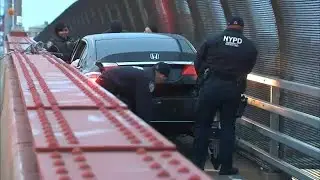 Whoops! Car becomes stuck in pedestrian lane of Pulaski Bridge