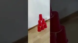 Knocking down cups with my mind trick #cuptower #cups #magic