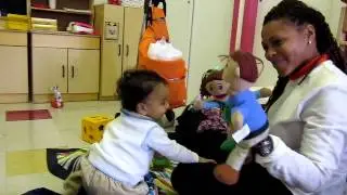 11.1 month old baby Emperor @ play therapy w puppets