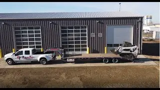 Double A Gooseneck Trailer - Loading Skid Steer - Featuring Conqur Beavertail Ramps