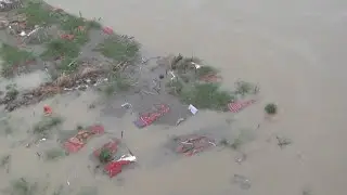 India's Covid graves exposed as Ganges river floods