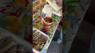 Elote cocido con mayonesa, chile y queso en Tamaulipas