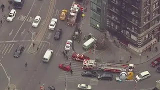 Van Jumps Curb In Chinatown