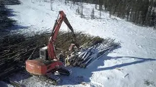 Drone/ Aerial Footage of Logging Machines in Northern Canada | FREE Stock Footage