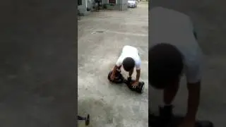 little boy riding a hoverboard