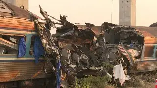 Workers at site of Thailand train disaster | AFP