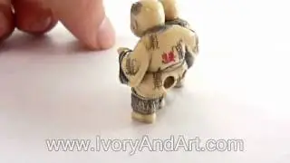 Mammoth ivory Netsuke - 2 Children Read a poem