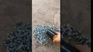 Bersi A9 industrial vacuum picking up nuts/metal chips