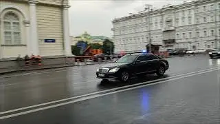 Russian traffic police and Government cars responding with flashing lights and siren