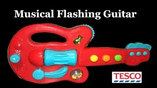 Tesco Musical Flashing Guitar Activity Toy