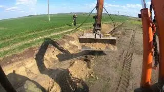 Regrading the ditch.