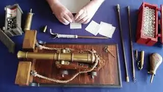 Cartridge and loading demonstration for a muzzle loading cannon.