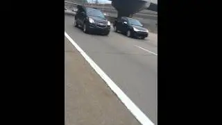 Changing tire on i696 in rain