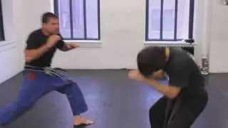 How to Escape a Rear Choke with a Push | Krav Maga