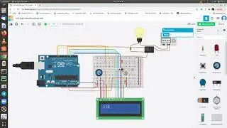 Lightsensor Bulb relay and LCD circuit Tinkercard