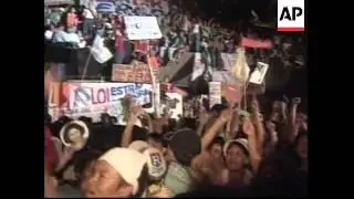 large pro- Estrada supporters outside prison