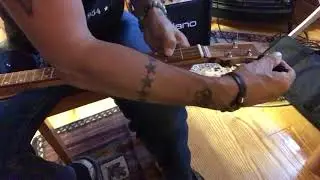 Changing strings on your 3 string Cigar Box Guitar, fretless or shovel.