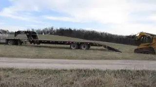 loading skidsteer (like a boss)