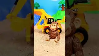 Toy JCB helps a monkey 🐒