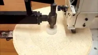 Automatic spiral sewing machine for stitching sisal buffing wheels