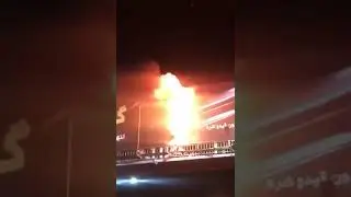 Iran Revolution 2022: -- Protestors In Mashhad, Iran Torch A Pro Regime Billboard