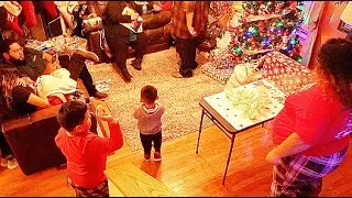Holiday Game Night: Throwing Balls into Cups for Christmas Prize Cheer!