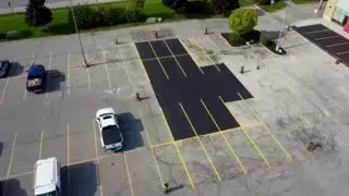 Parking Lot Restoration: Asphalt Repairs and Line Marking for Enhanced Safety and Appearance