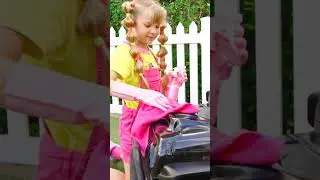Diana washes Roma's car