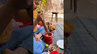 Monkey imitates human's eating gestures playfully.