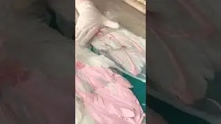 Making a pink feather gown