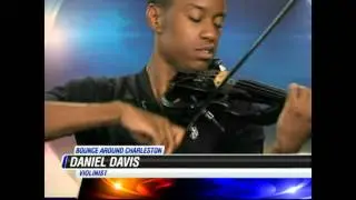 Violinist Daniel Davis performs on 