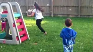 Blowing bubbles in the backyard