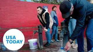 Ukrainians line up for water as Russian strikes target infrastructure | USA TODAY
