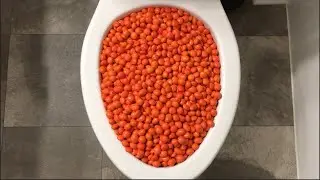 Will it Flush? - Orange M&M's