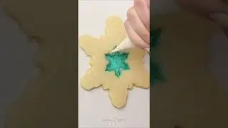 We made stained glass snowflake cookies with melted candy ❄️