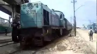 Loco 37076 departing Havana Coubre Stn with Mexican coaches assigned to Matanzas July 2019