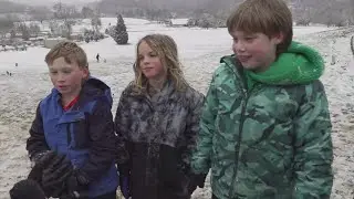 Shea Smith meets some sledders at Lakeshore Park