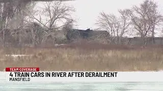 Shelter in place issued after train cars carrying flammable fuel overturn into Mansfield river