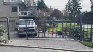 Residential Gate with Landscaped Entry  AD Construction Suburban Driveway Installation